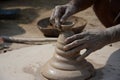 An Indian potter makes earthen lamps or Ã¢â¬ËdiyasÃ¢â¬â¢ ahead of the forthcoming Diwali festival